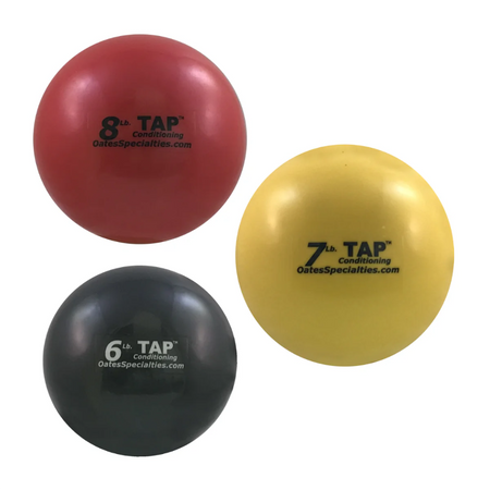 Black, yellow, and red TAP® Mini-Medicine Balls, representing the heavy set (6lb, 7lb, and 8lb), for advanced strength and power training.