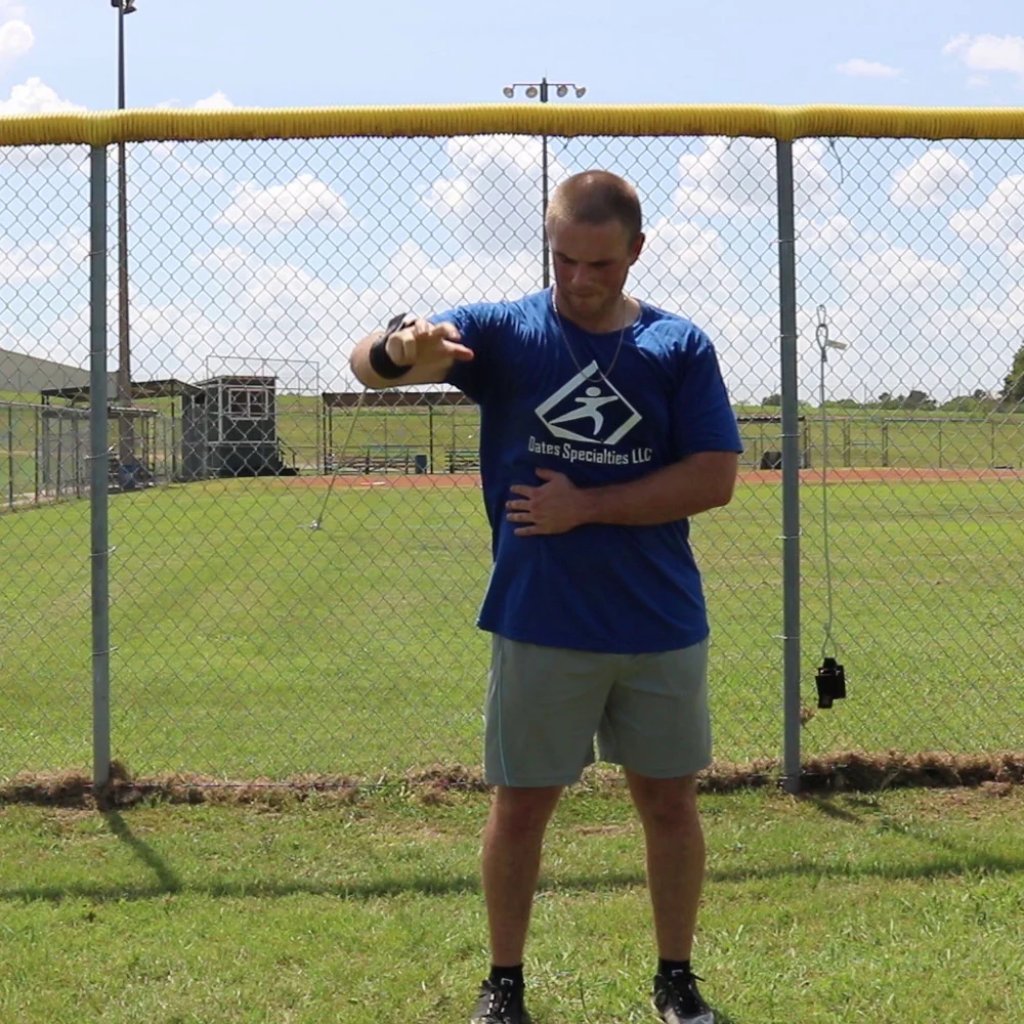 Athlete engaged in shoulder-strengthening exercises to enhance performance, mitigate injury, and support long-term joint health.