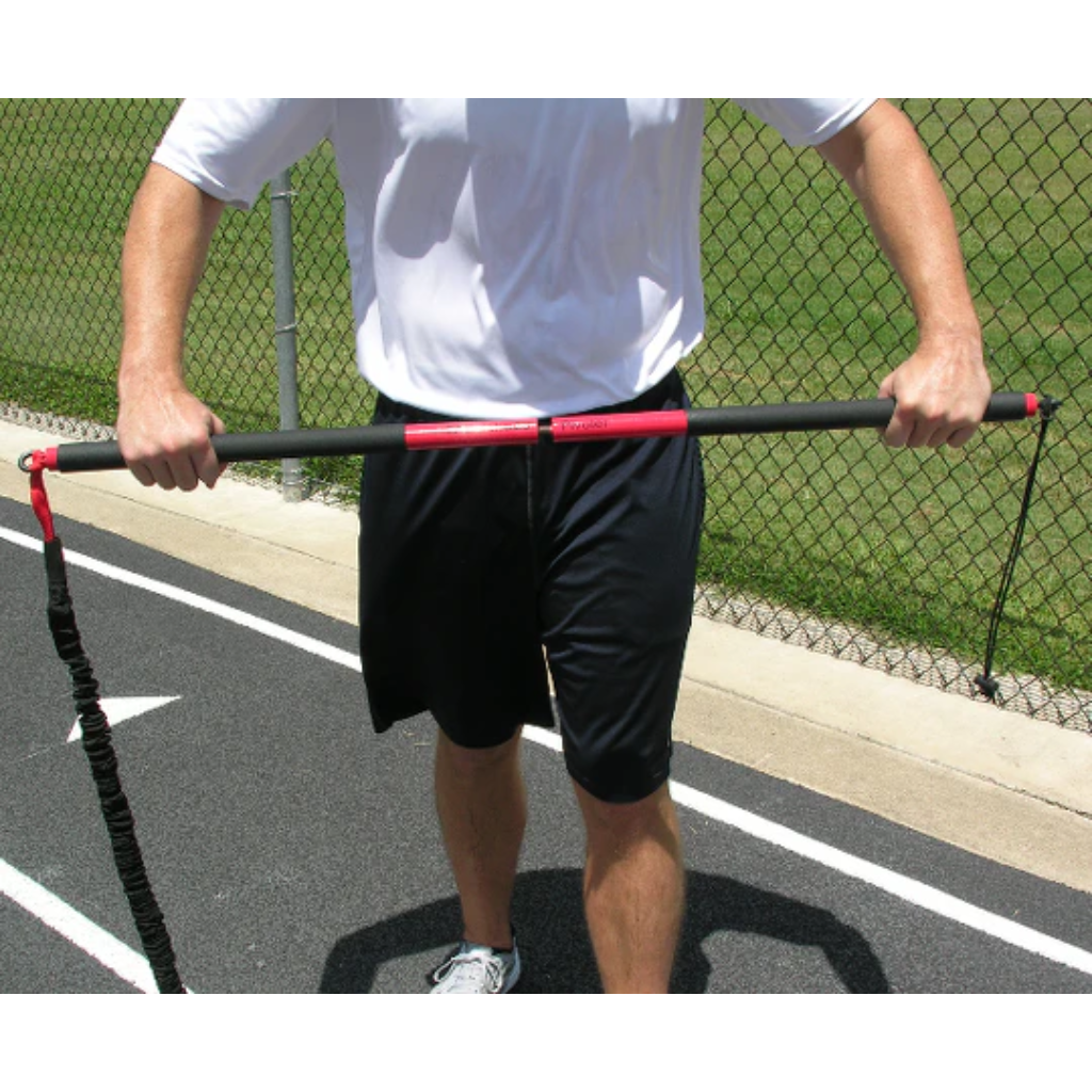 Athlete using a threaded stud to assemble the KHAOS® Pivoter Bar, preparing for a strength and stability workout with dynamic resistance training.