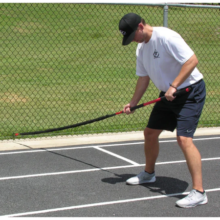 Athlete performing resisted trunk twists with the KHAOS® Pivoter Bar, engaging core stability, rotational strength, and controlled movement during dynamic resistance training.