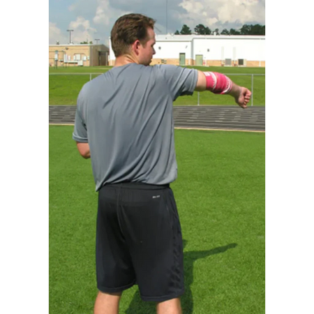 Rocket Wrap Compression Floss wrapped around the arm during a pronating motion, illustrating strategic blood flow restriction to enhance neuromuscular activation and joint mobility.