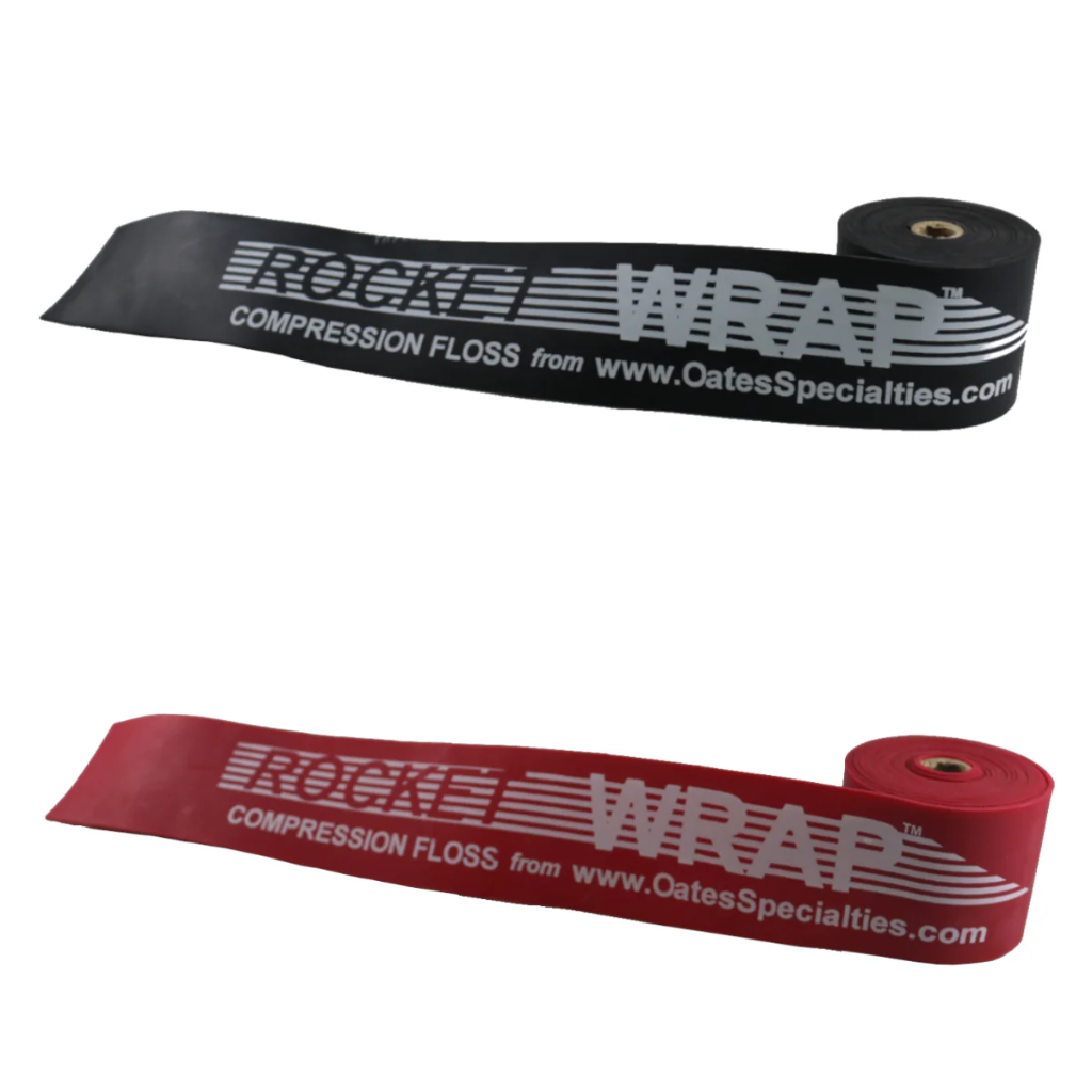 Black Rocket Wrap Compression Floss positioned on top of Red Rocket Wrap, both coiled neatly to showcase contrasting resistance levels and durable latex construction.