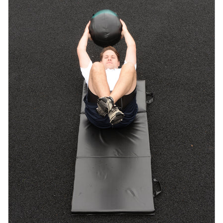 Soft Medicine Ball above head for sit up slams for intense core training