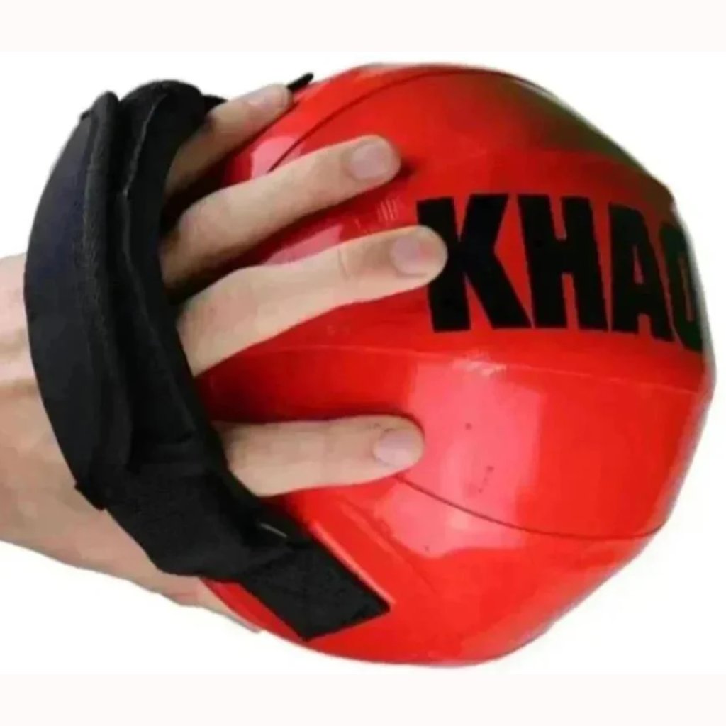 Shoulder Shaker being held in hand showing the adjustable handle and comfort strap of the dynamic water training device