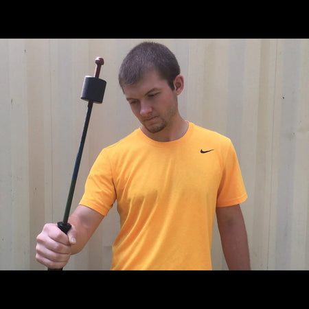 An athlete performs a wrist-strengthening exercise using the Supi Pro device, executing a controlled pronation movement to target forearm and wrist muscles and highlighting the adjustable weight feature.