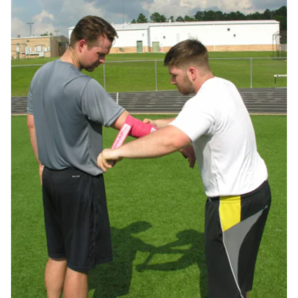 Rocket Wrap Compression Floss being applied around an elbow, demonstrating targeted compression to enhance blood flow and support joint mobility during recovery.