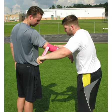 Rocket Wrap Compression Floss being applied around an elbow, demonstrating targeted compression to enhance blood flow and support joint mobility during recovery.
