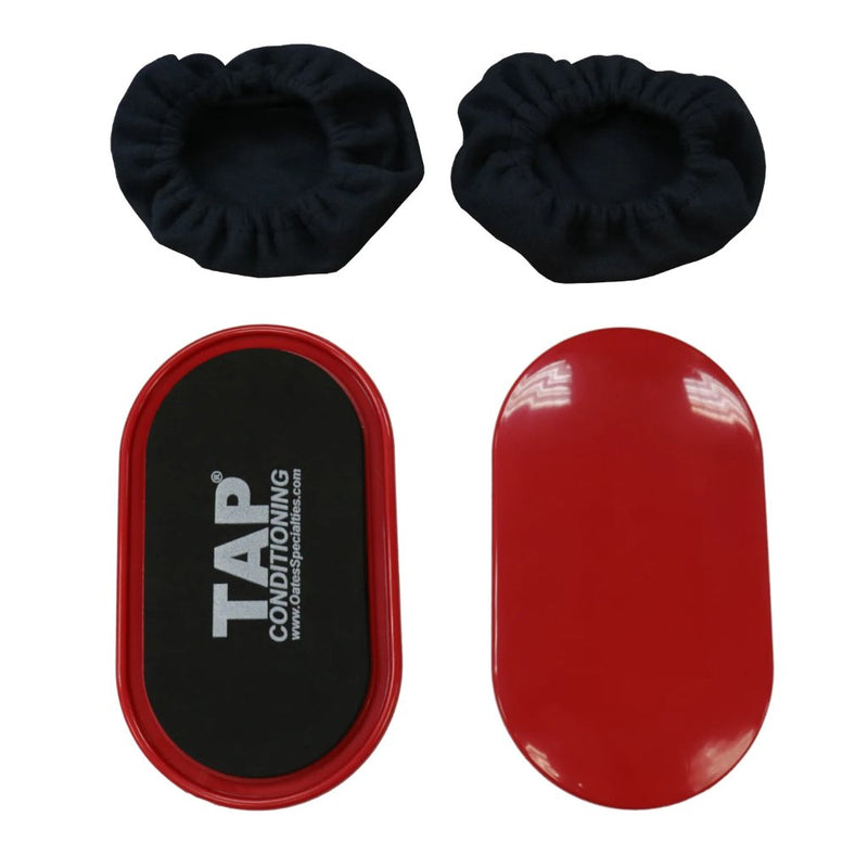 A pair of red TAP Gliders for core and stability training, with black booties for hard floors, displayed on a white background.